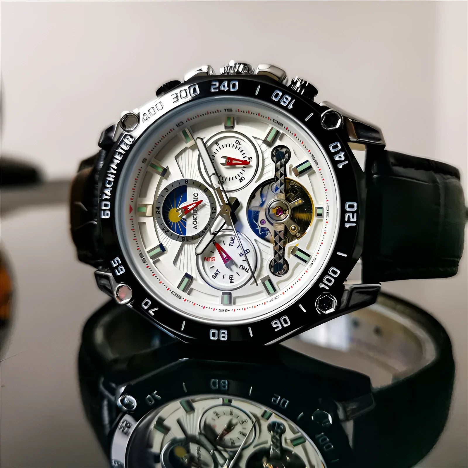 Men's automatic mechanical watch with 12mm case in black steel, silver, and gold finish options.