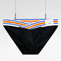 Solid color low waist cotton briefs for men with full package hip bulge design in black