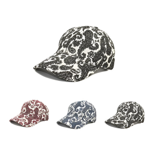 Blue polyester baseball cap with a white paisley pattern, showing the dome crown style.