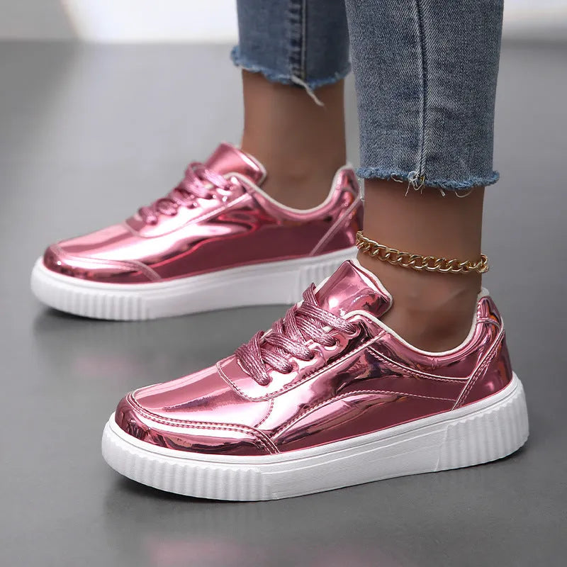 Gold sequinned platform sneaker with round toe and thick MD sole.