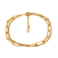 Gold titanium steel electroplated women's bracelet with geometric double layer chain design.
