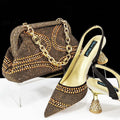 Women's pointed toe high heel shoes with decorative rhinestones and a matching small bag, shown in blue.
