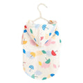 Colourful cartoon umbrella print dog raincoat in polyester fabric.