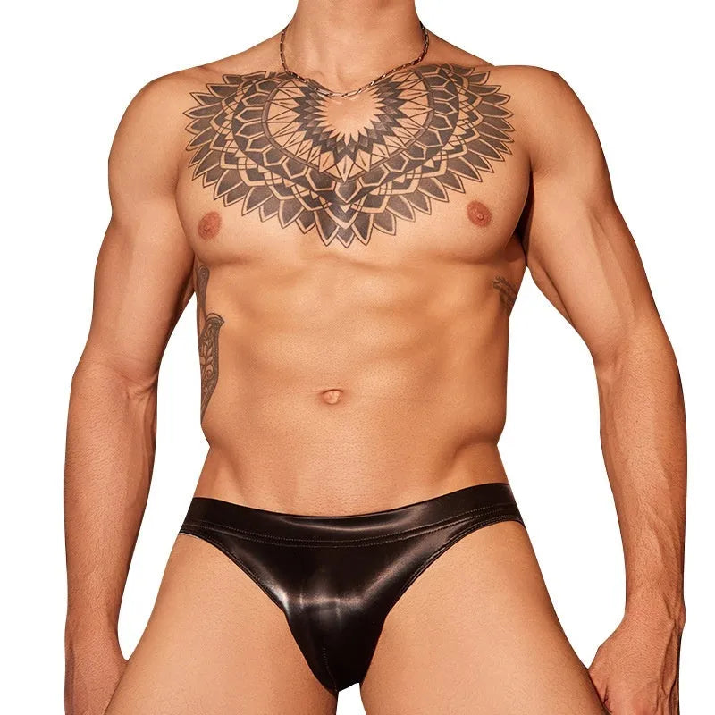 Men's black shark skin lace hipster briefs on a white background.