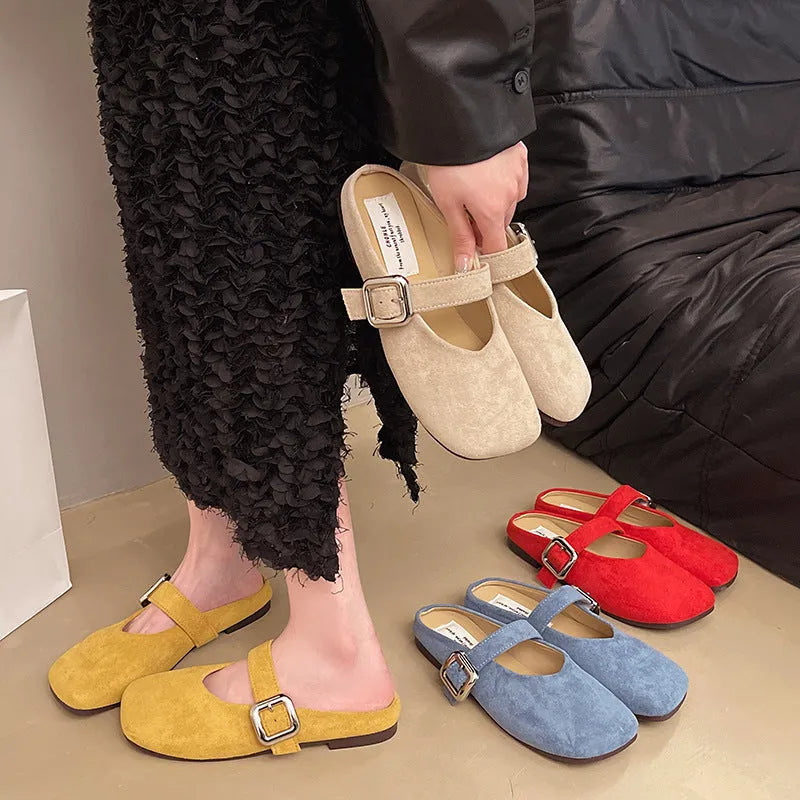 Women's flat closed toe slippers in apricot colour with a square toe and rubber sole.