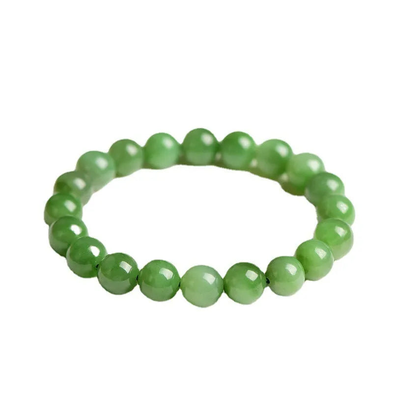 Polished natural Jasper Hetian jade bead bracelet on wrist, showing bead detail.