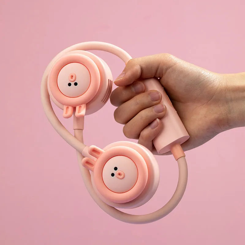 Pink folding leafless neck fan worn around neck showing three-speed controls and USB charging port