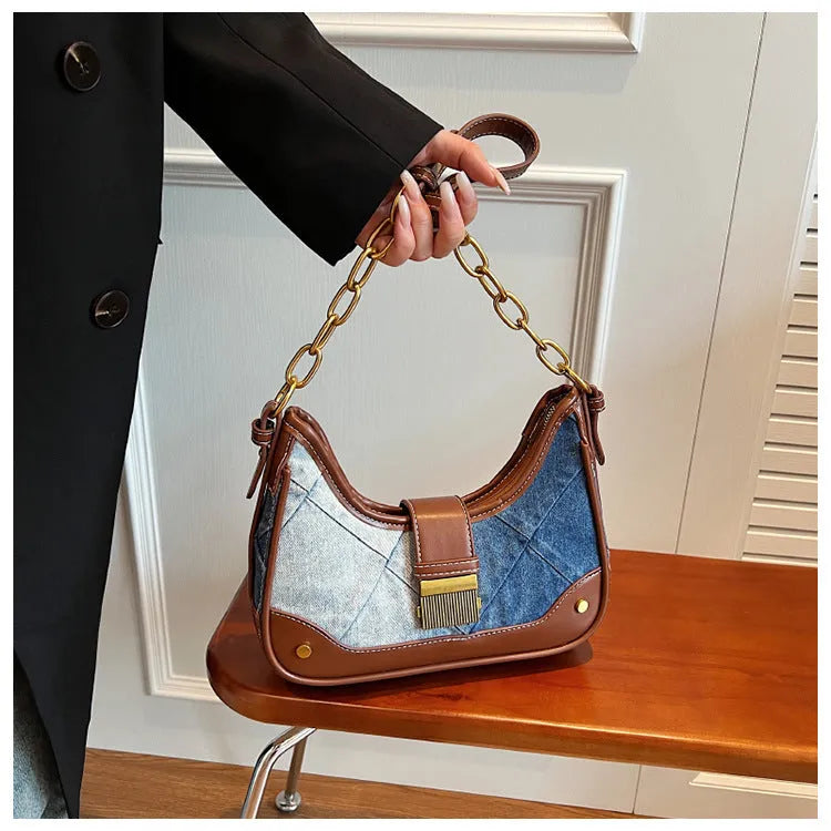 Brown denim women's shoulder bag with chain detailing and bucket shape design