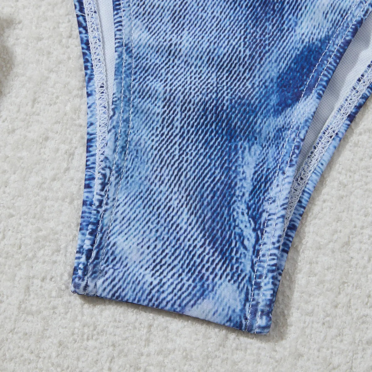 Women's denim blue printed bikini with adjustable straps, shown front view