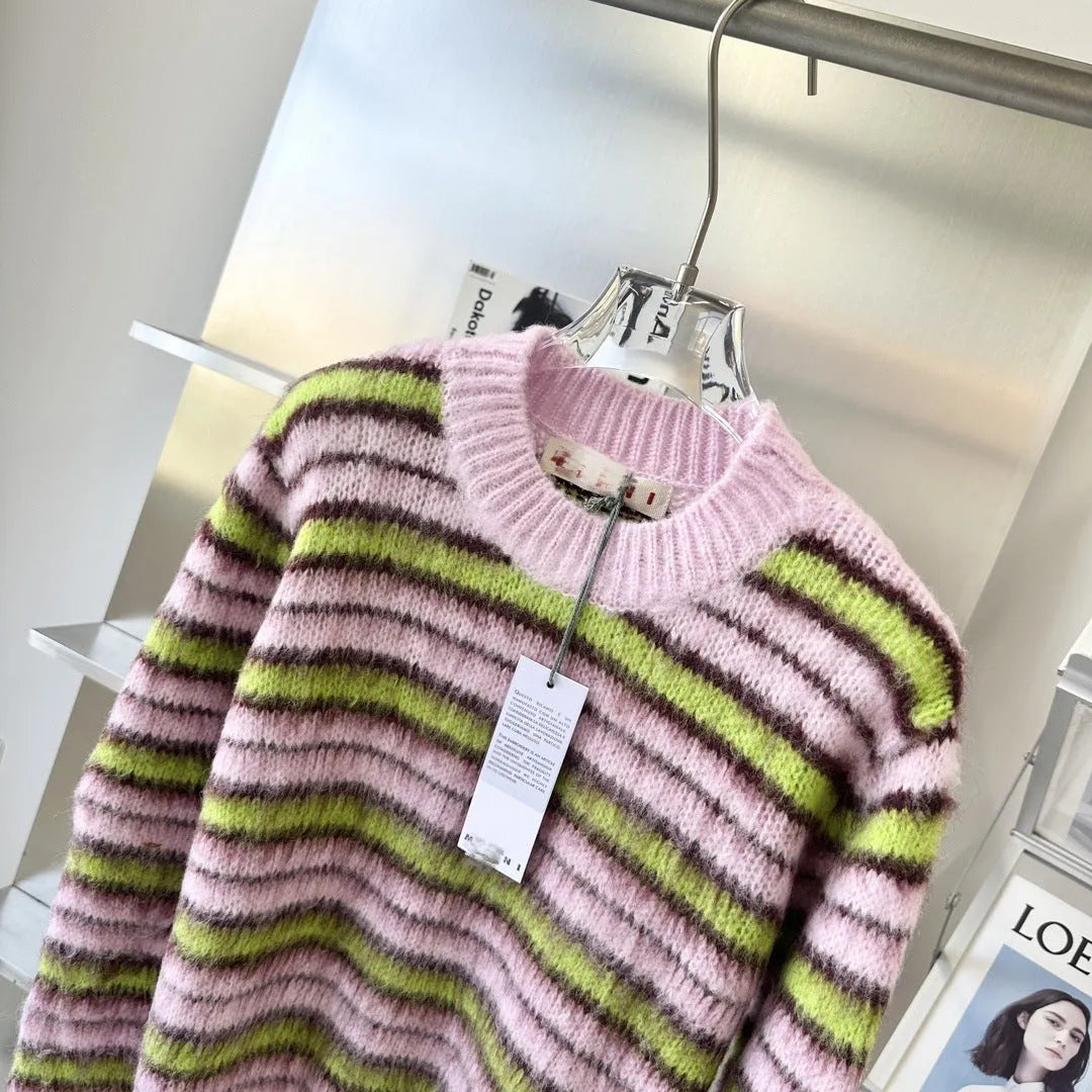 Pink haima wool lazy coat cardigan sweater with nap texture on a hanger