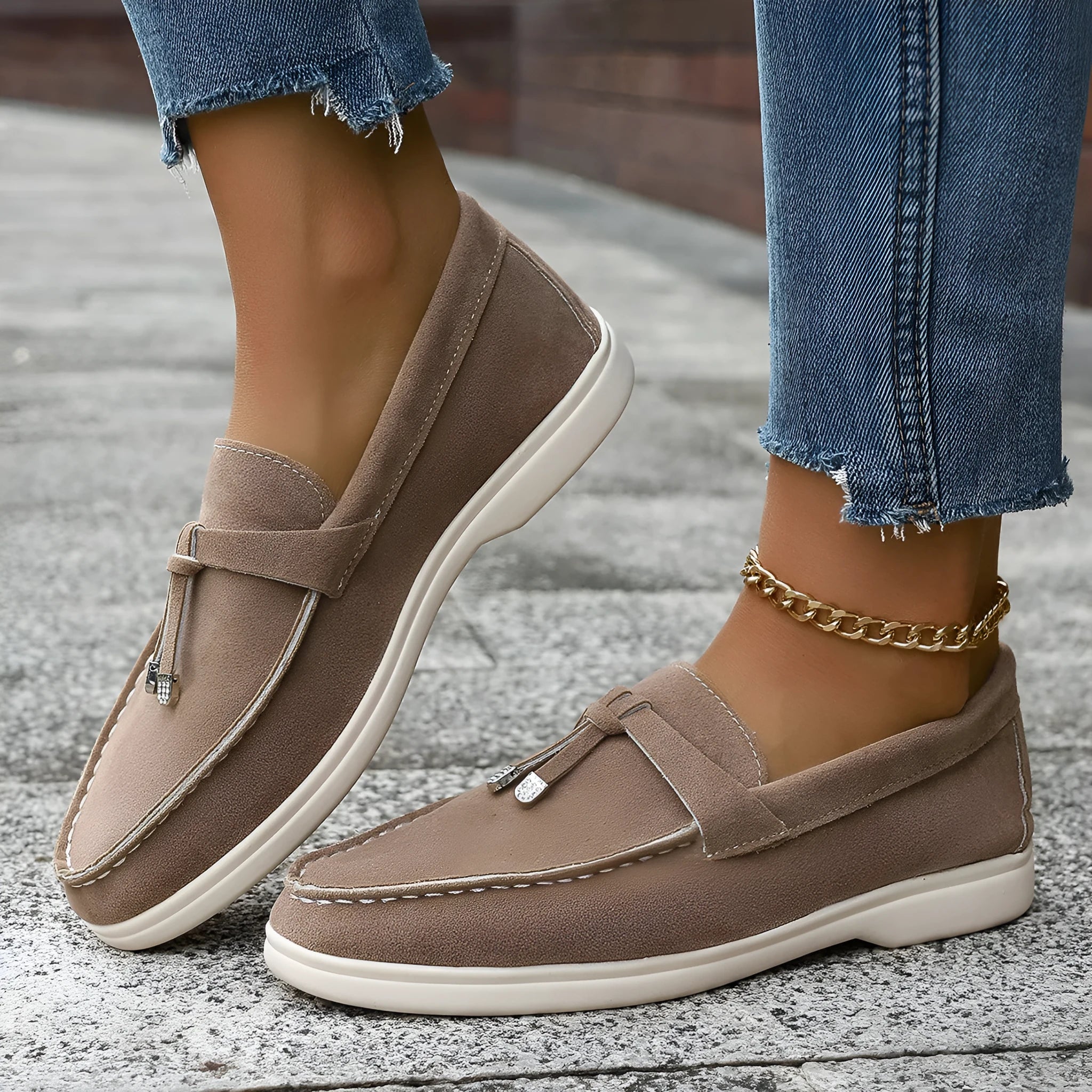 Casual canvas slip-on loafers with a platform heel and round toe in black, apricot, and brown colour options.