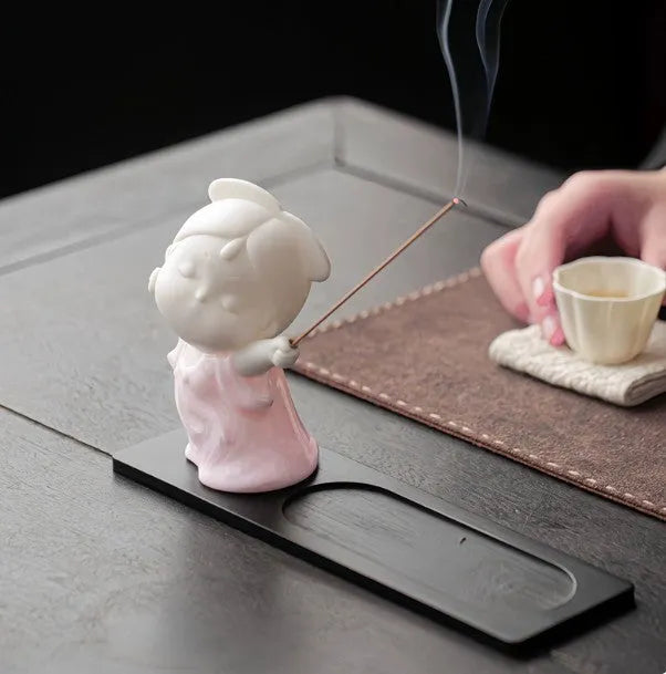 Ceramic cute court attendant figurine incense burner decoration in various colours.