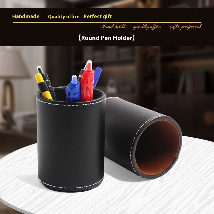 Round black leather pen holder showing cylindrical shape for desk organisation