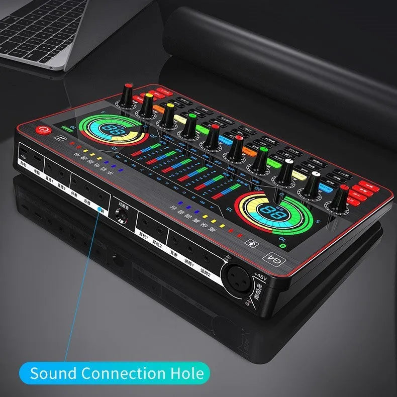 G4 professional sound card mixer with colourful LCD display, connected microphone, and included cables and remote control.