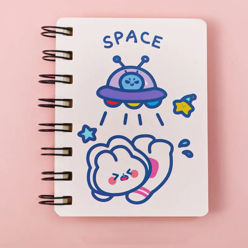 Astronaut themed flip-over pocket notebook showing 10.5cm by 8cm compact size