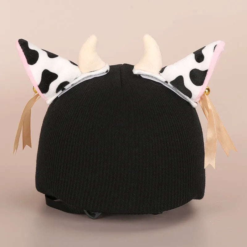 Cartoon-themed plush fabric helmet cover and ear decorations set for motorcycles and bicycles.