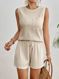 Women's solid colour polyester vest and shorts set in apricot or orange with Asian sizing options
