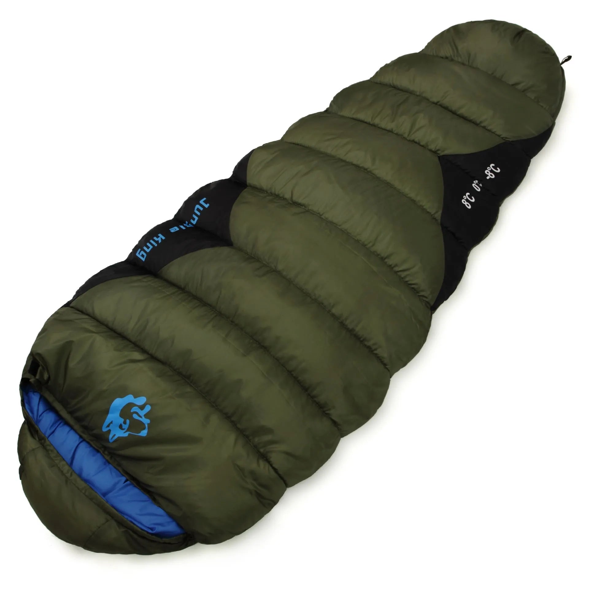 Outdoor cotton sleeping bag in Army Green with its compression storage sack laid beside it.