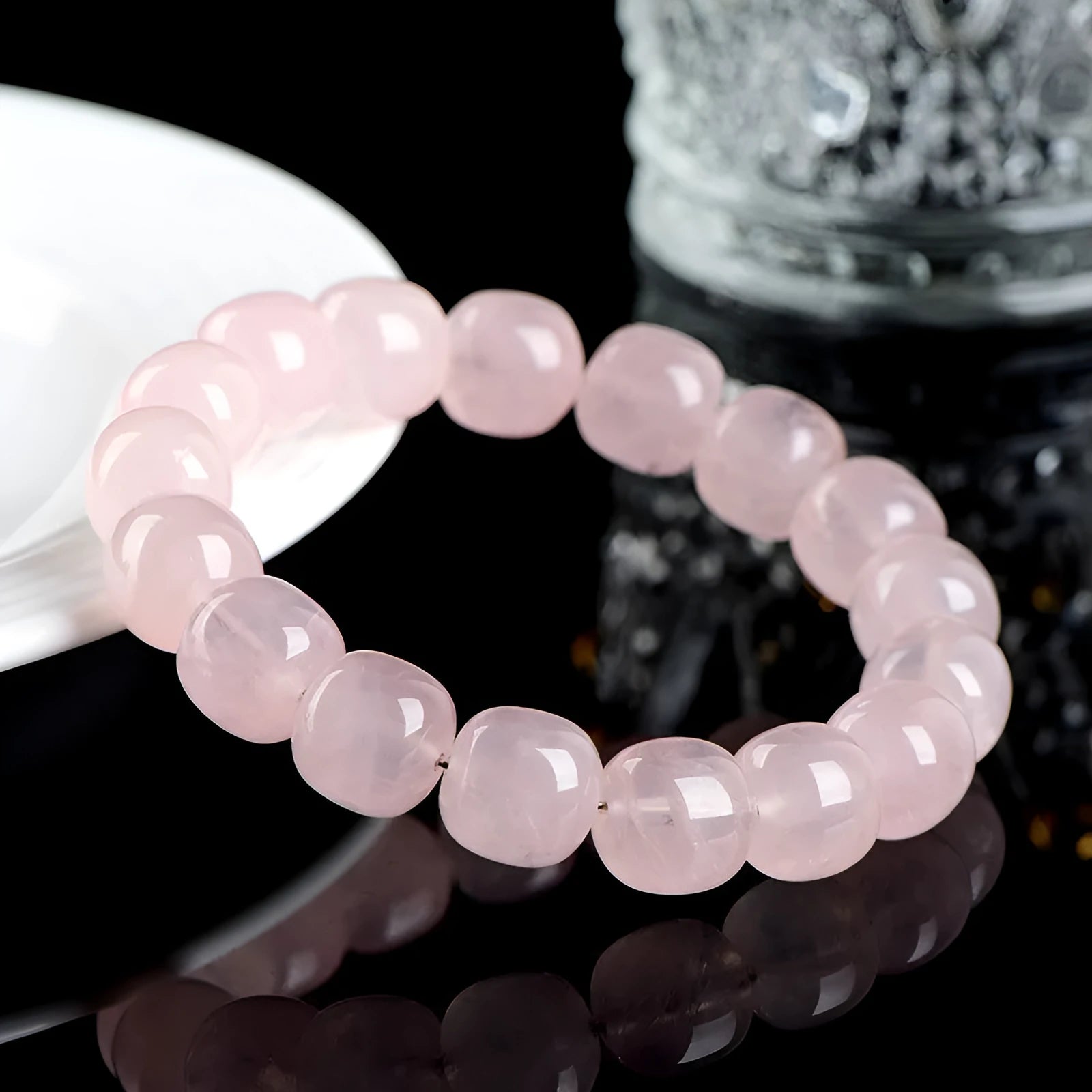 Pink bamboo crystal bracelet with 11-12mm barrel beads and geometric elements