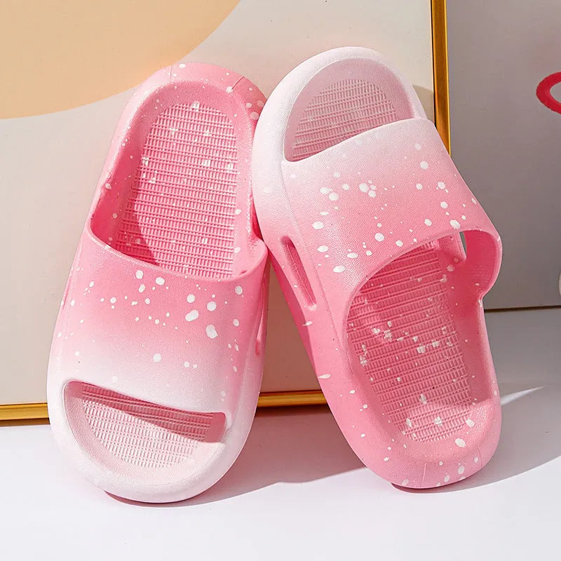 Gradient coloured children's PVC summer slippers with non-slip soles in blue, yellow, green, orange, pink, or black.