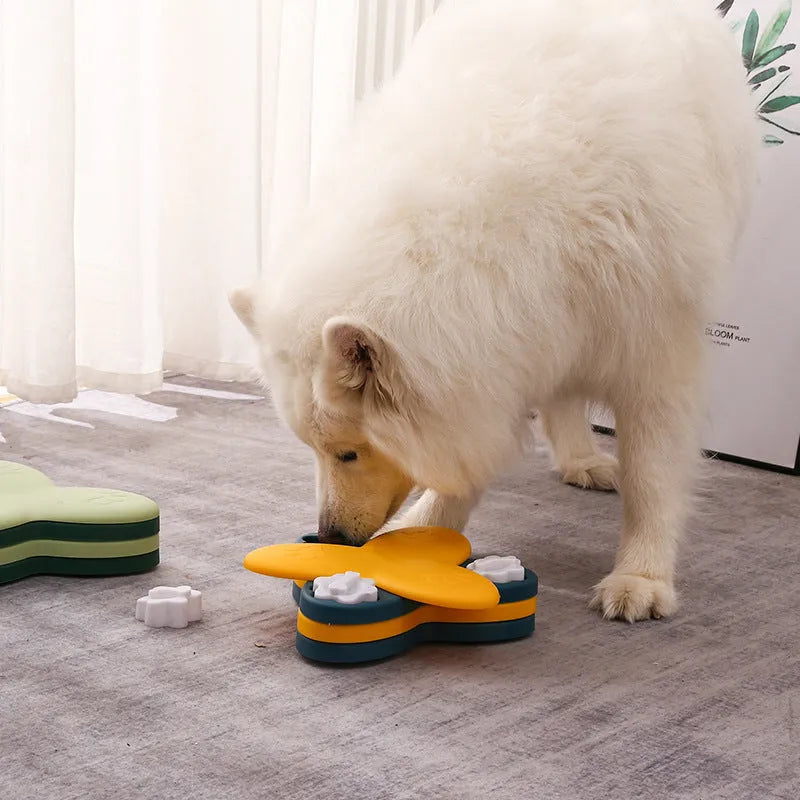 Green and yellow dog puzzle toy slow feeder with 9 compartments and bone-shaped covers
