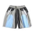 Blue patchwork quick-drying outdoor shorts with loose straight-leg design and elastic waistband