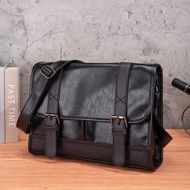 Black Korean-style men's commuter backpack with anti-theft feature and sewing thread detailing.