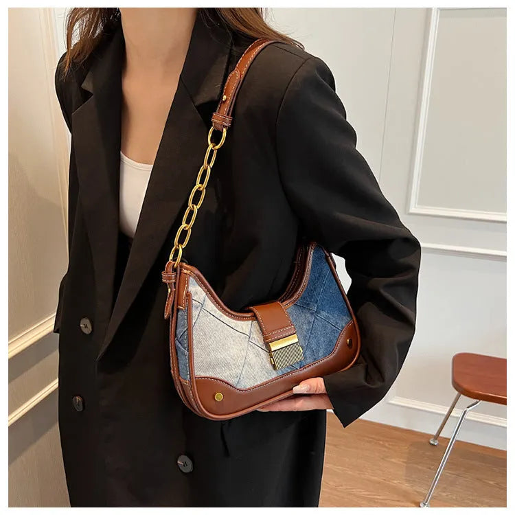 Brown denim women's shoulder bag with chain detailing and bucket shape design