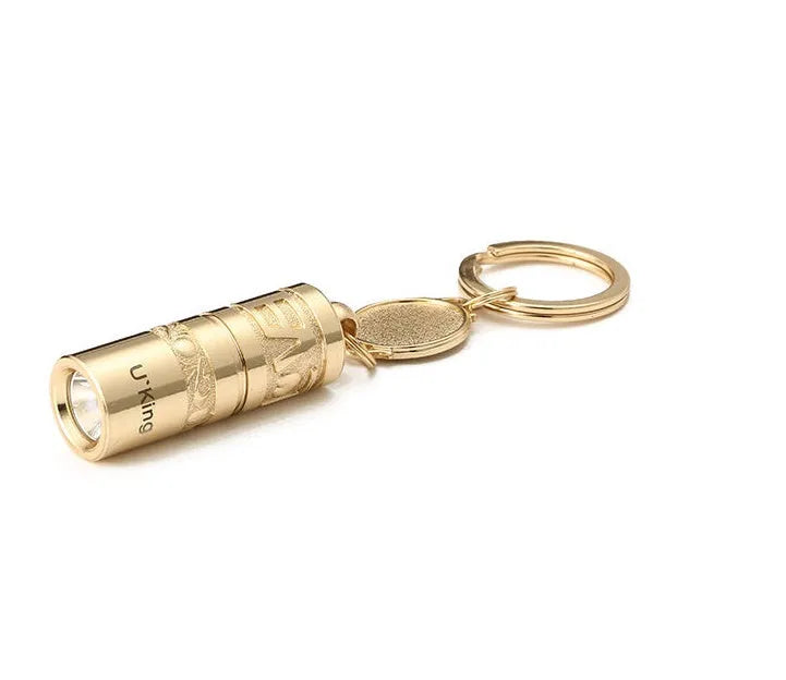 Gold zinc alloy waterproof mini LED flashlight attached to a keychain ring.
