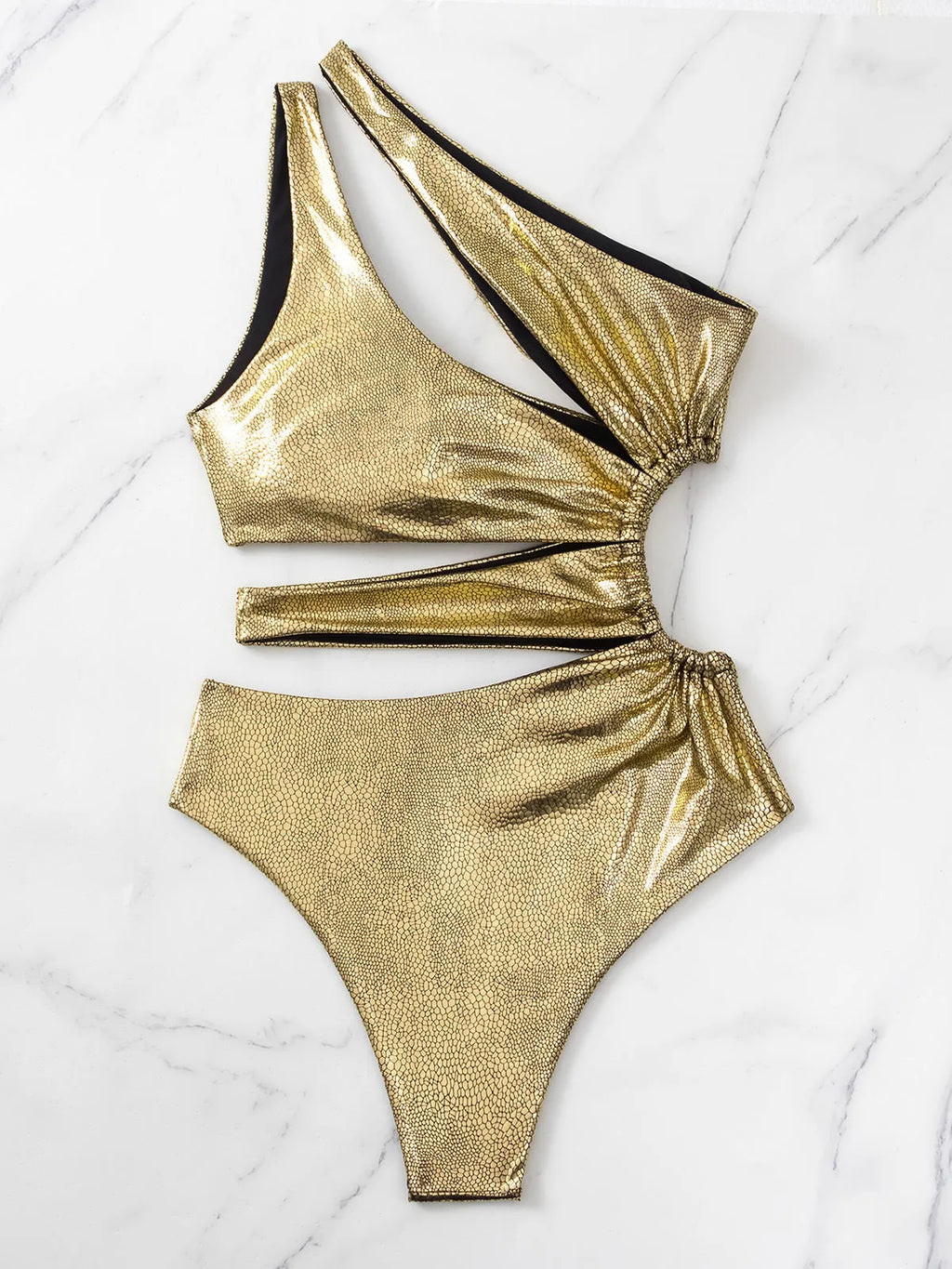 Women's one-piece swimsuit in gold colour with backless design and sleeveless cut