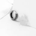 Silver geometric stud earrings with a retro striped twist pattern, made from titanium steel.