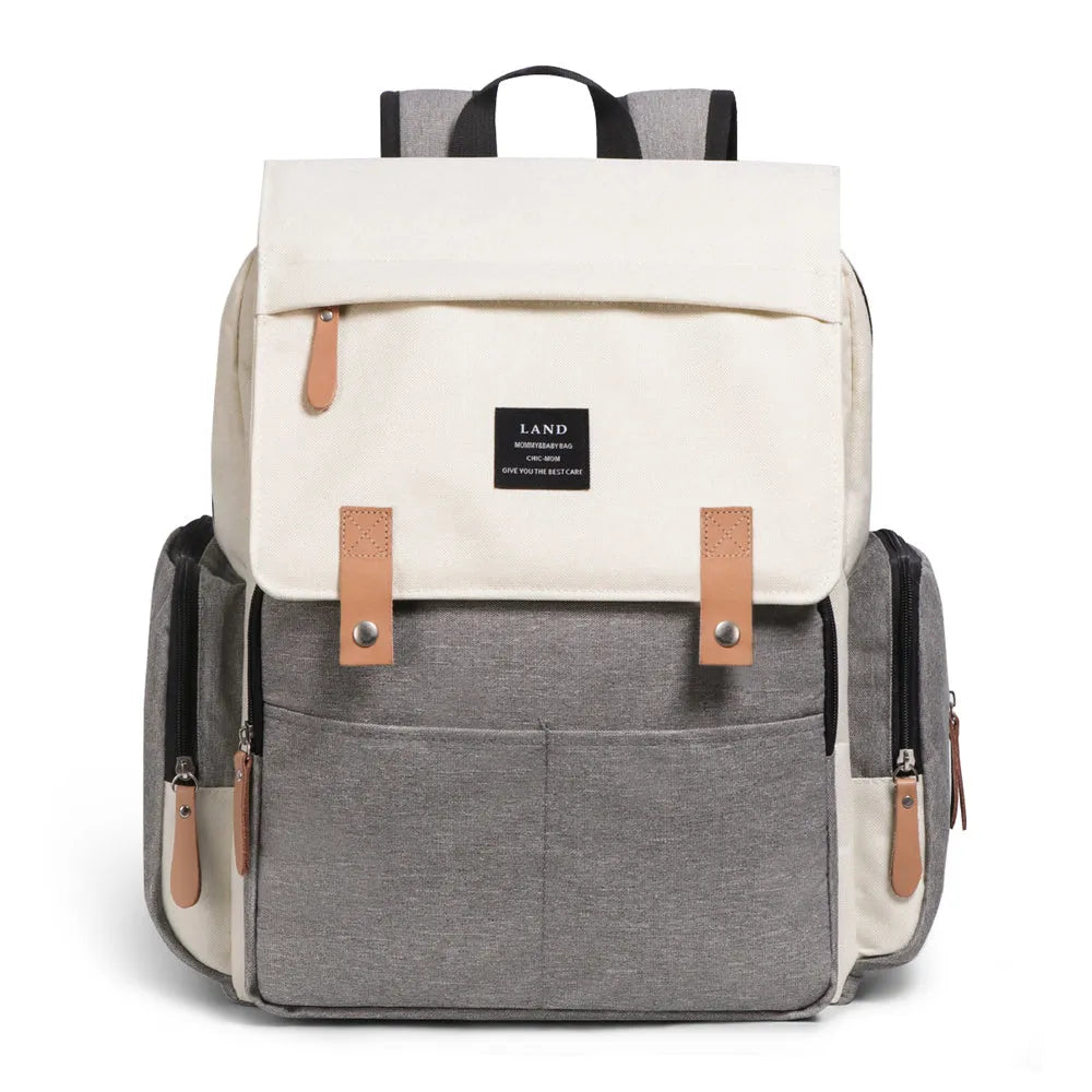 LAND Mommy Diaper Bag Backpack in oxford cloth with changing mat, shown in beige colour.