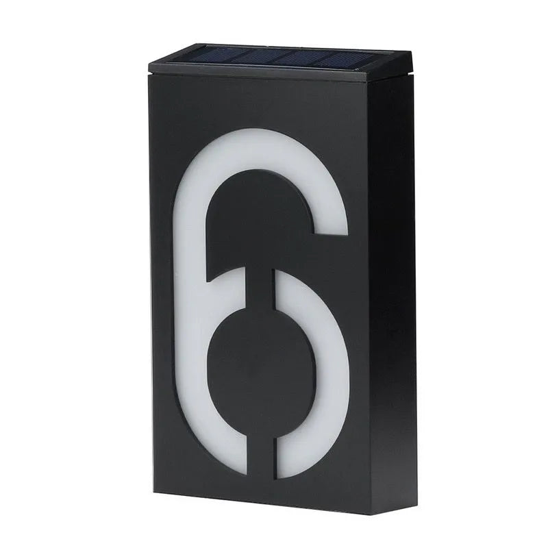 Solar powered white LED house number light mounted on a wall with IP65 waterproof rating