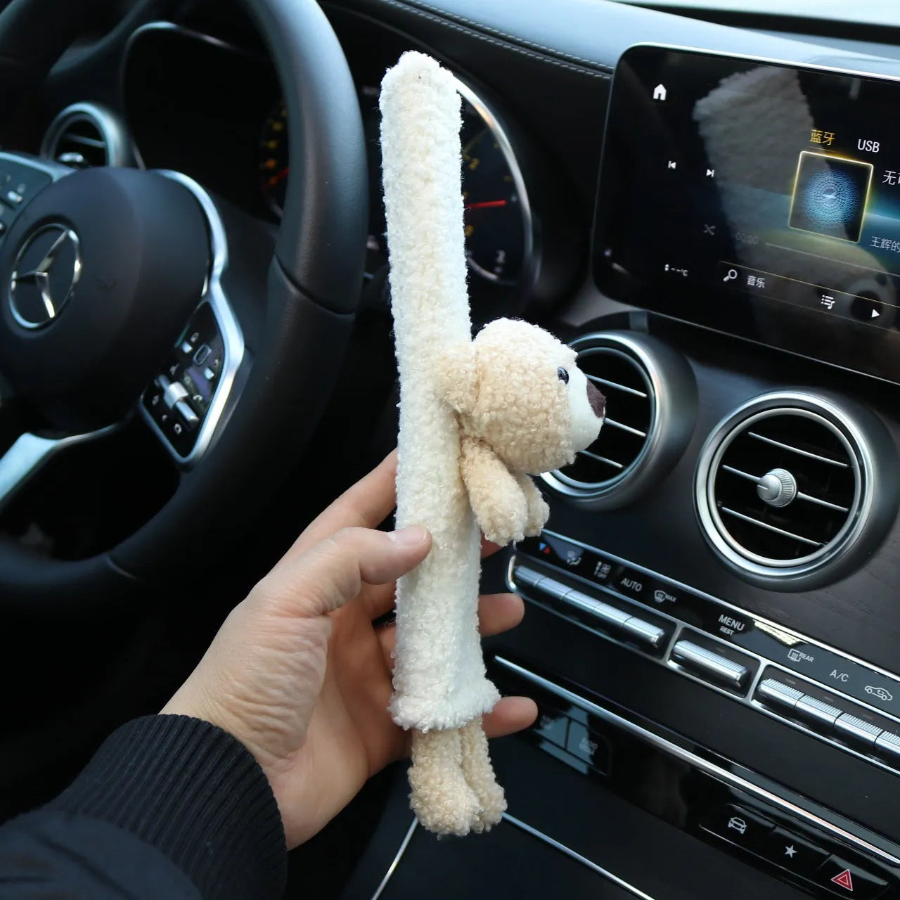 Cartoon plush lamb wool seatbelt shoulder protector in bear and rabbit designs.
