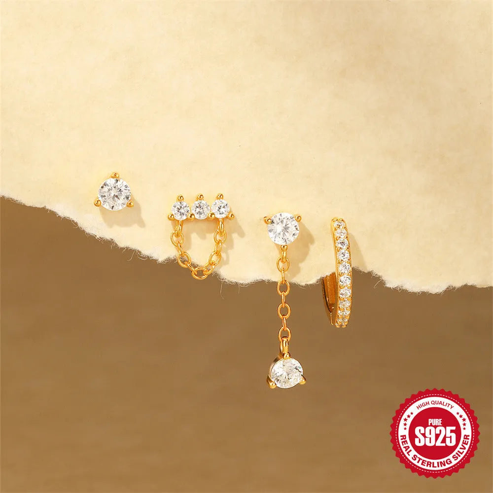 A pair of geometric clover petal earrings made of S925 sterling silver with a gold electroplated finish.