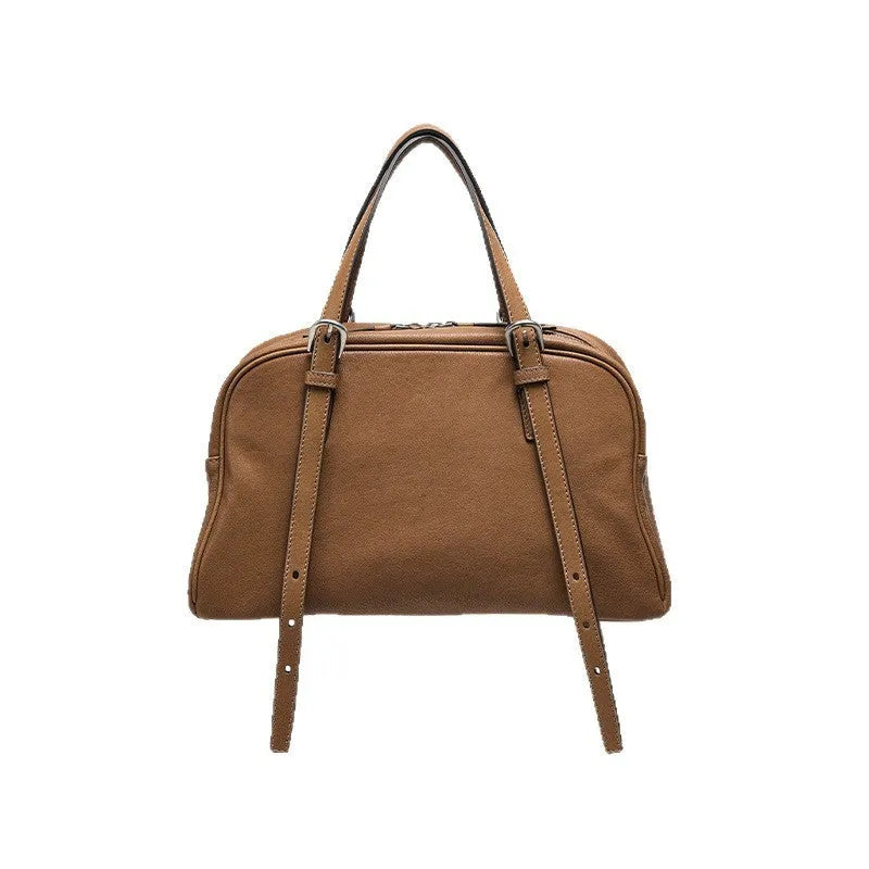 Women's genuine leather retro shoulder bag showing horizontal square design with double straps in black colour option.
