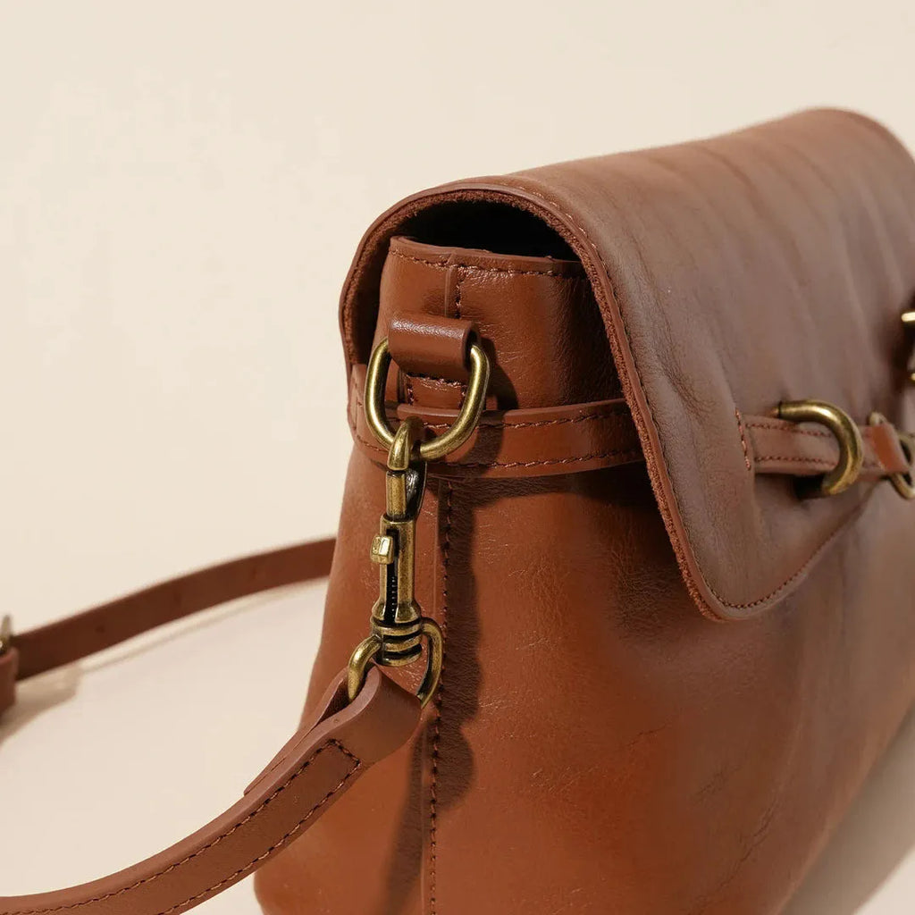 Genuine leather crossbody bag in Sugar Brown with sewing thread detail and clamshell opening