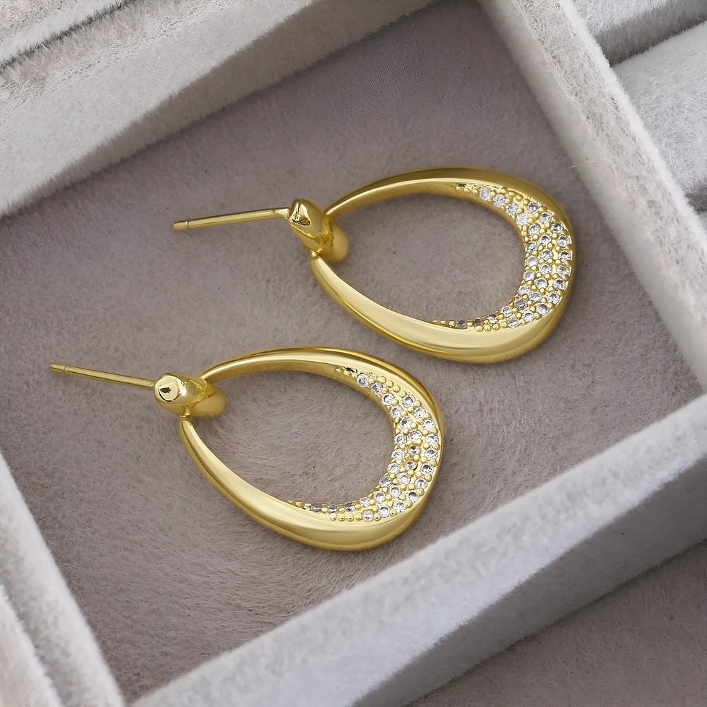 Women's yellow gold geometric drop earrings with copper electroplated finish measuring 2.6cm by 1.7cm