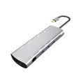 Grey USB-C docking station with HDMI, VGA, and USB 3.0 ports on aluminium alloy body