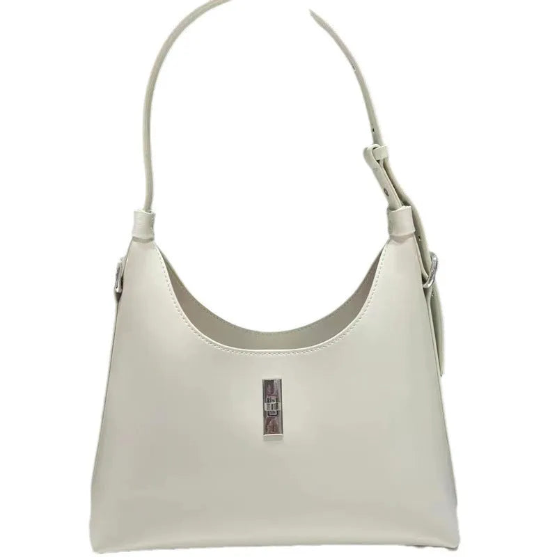 Genuine leather dumpling-shaped crossbody shoulder bag in apricot colour with a front sandwich pocket.