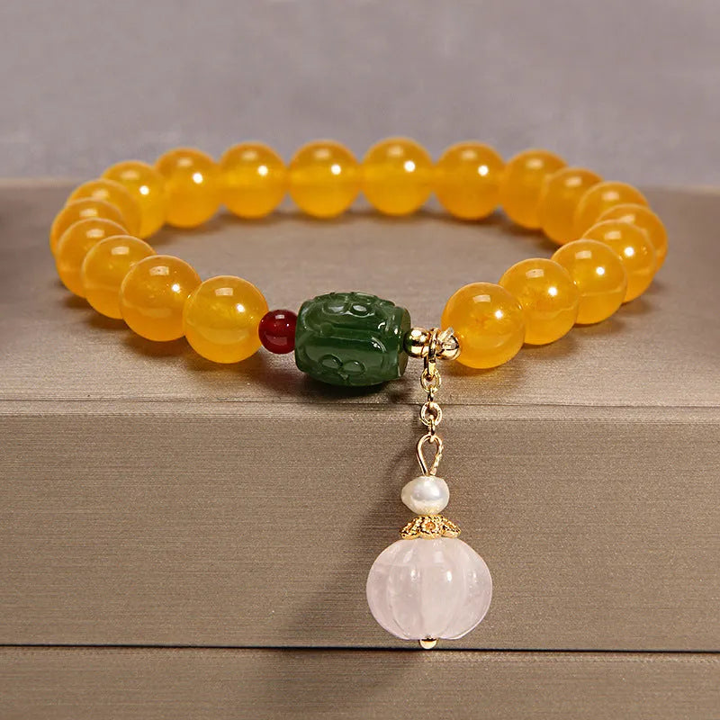 Khaki yellow agate and crystal women's bracelet on gold silk string.