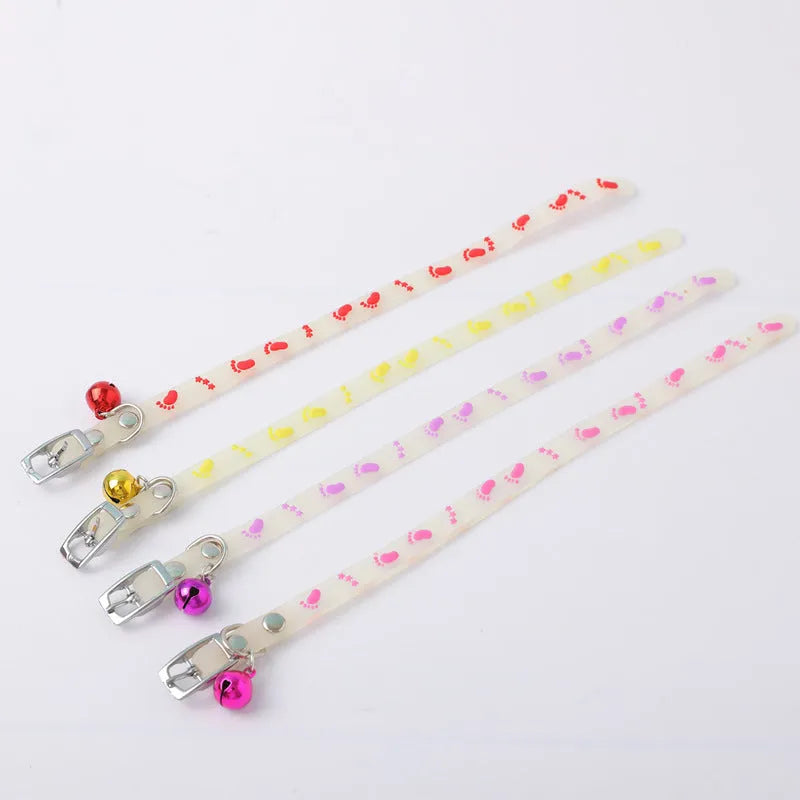 Glow in the dark cat collar with adjustable chain in paw print, love, fishbone, or footprint design.
