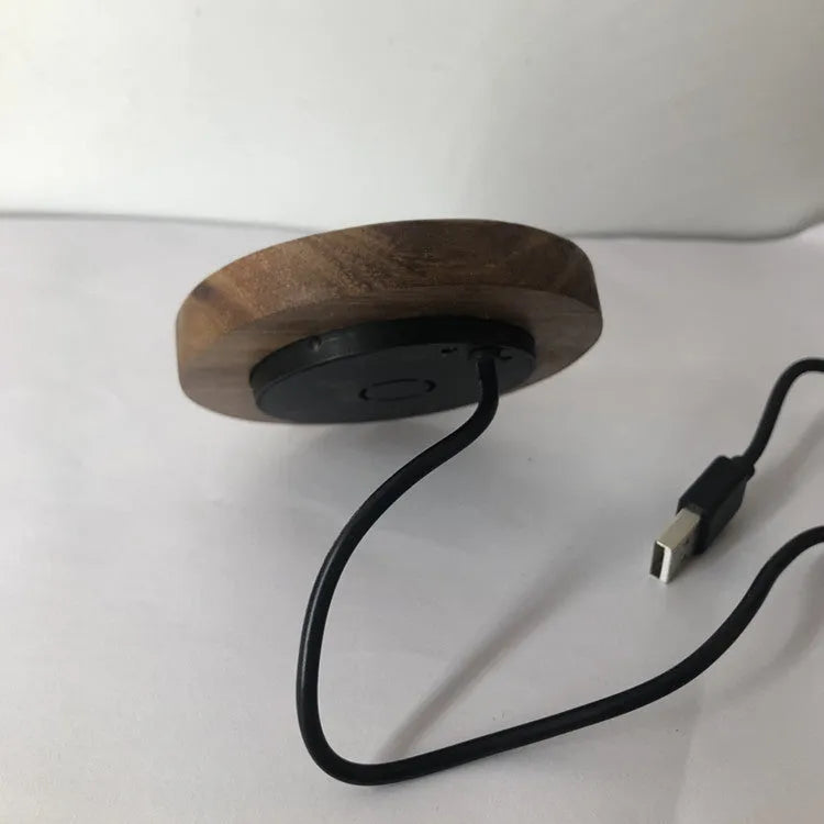 Round black embedded wireless phone charger for desks and tables