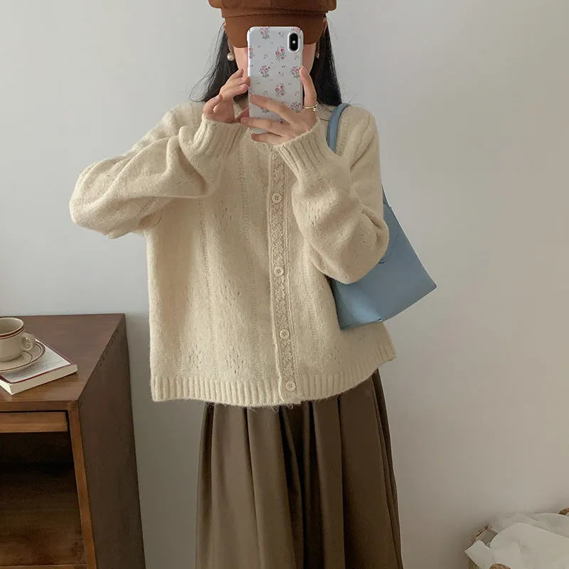 Artistic retro loose-fit sweater coat in viscose fibre, shown in apricot colour.