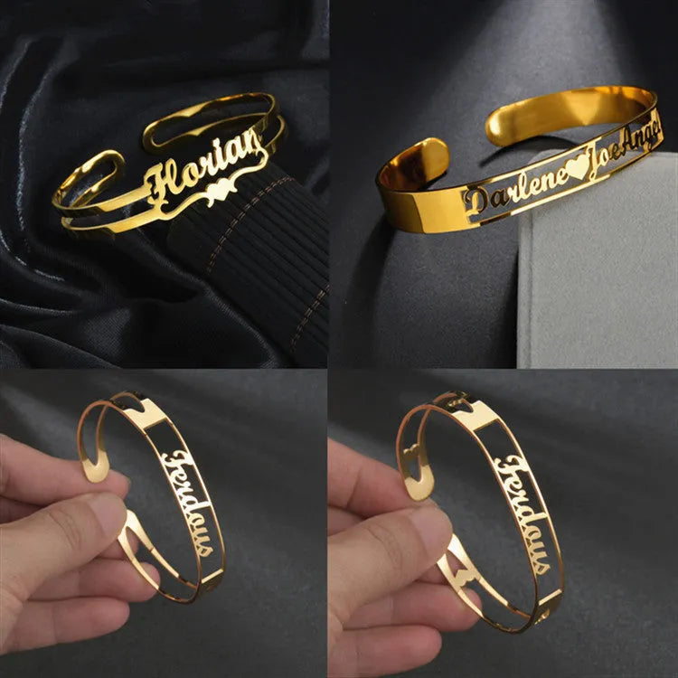 Custom engraved name bangle in stainless steel, silver colour finish, shown on a flat surface