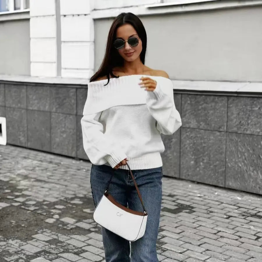 Grey off-the-shoulder sweater with a 3D pattern texture, showing strapless neckline design.