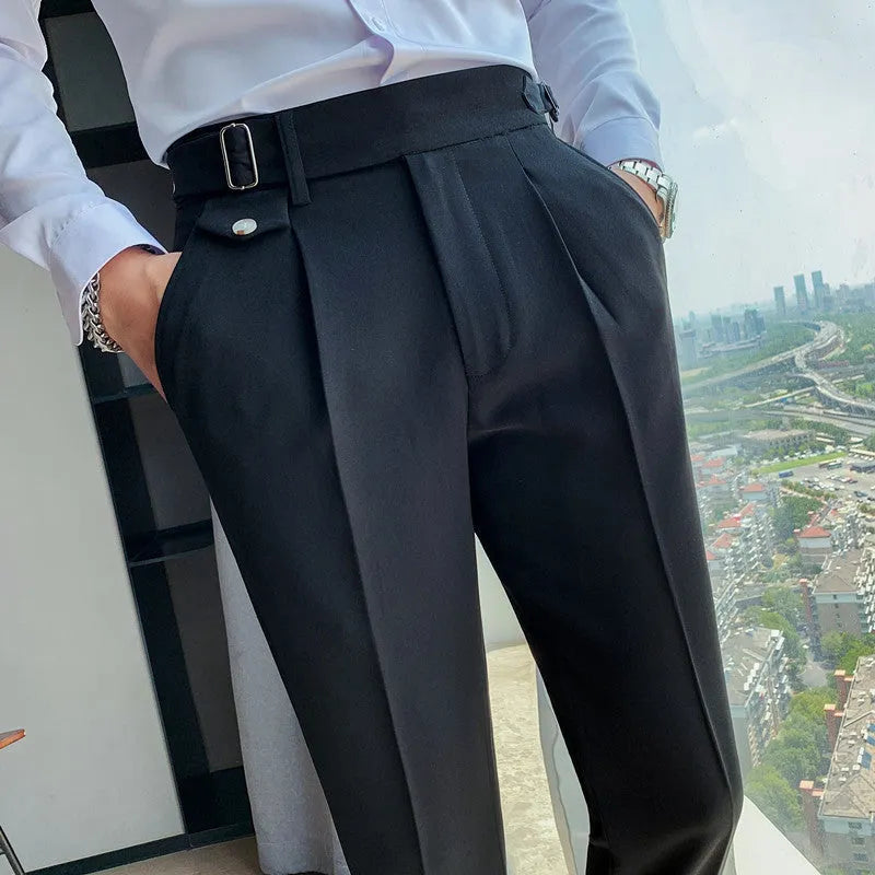 Straight-leg solid colour casual trousers in polyester on a size chart showing waist sizes 29 to 36.