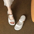Women's apricot leather peep toe flat platform sandals on white background