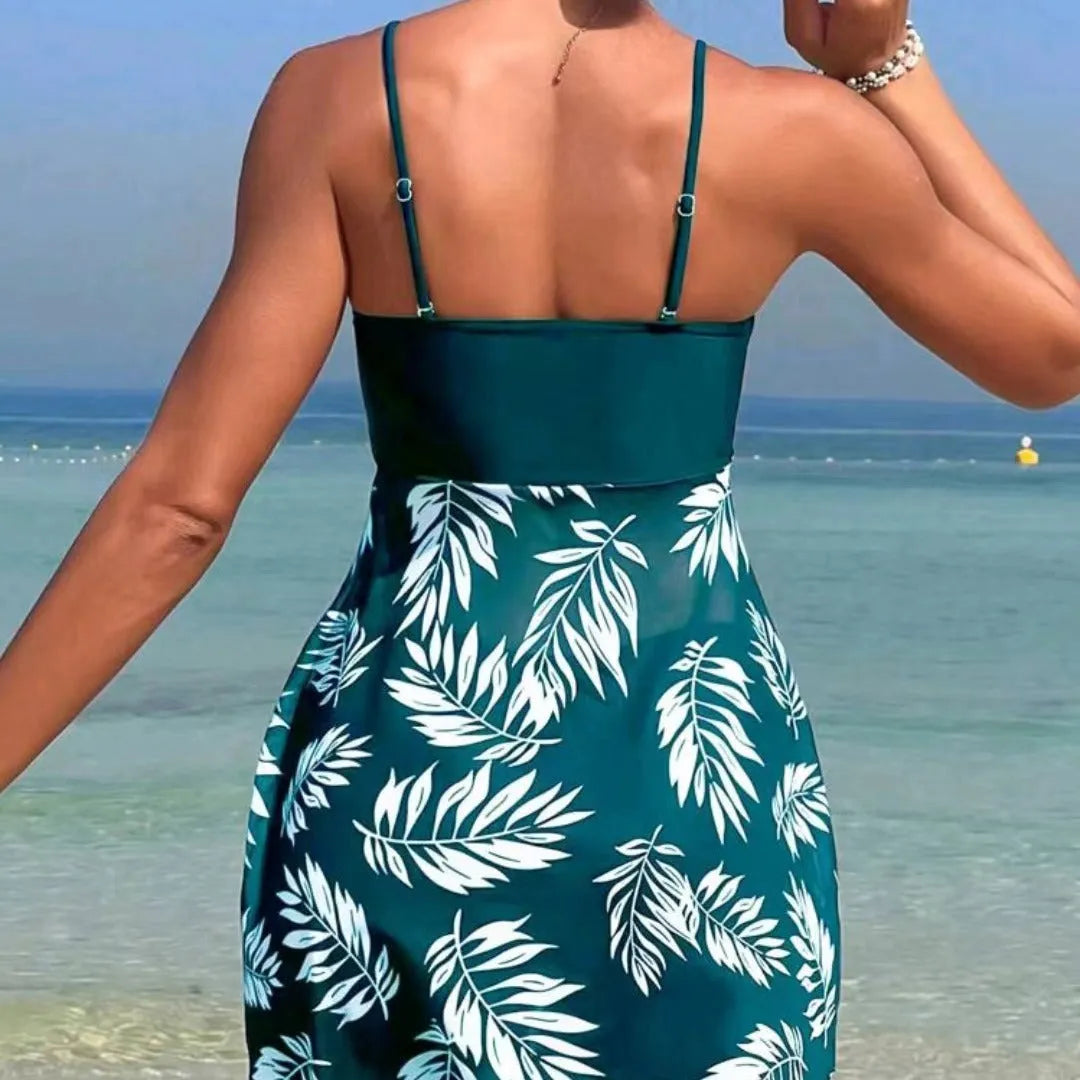 Women's high-waist mesh swimsuit briefs in black, blue, and peacock green on a white background.
