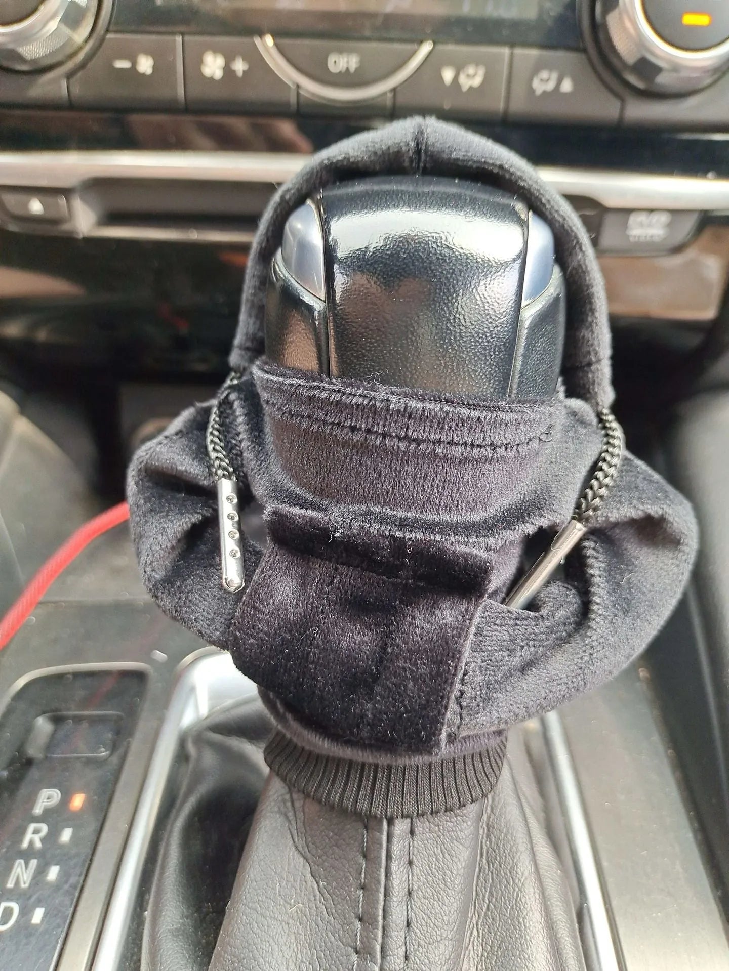 Pure cotton handmade gear lever cover in red, black, white, orange, pink, and peacock blue colours.